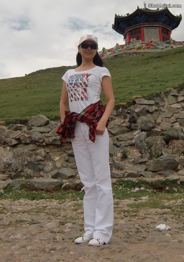 在青海旅行穿白裤骑牛的气质老师[第1张/共6张]